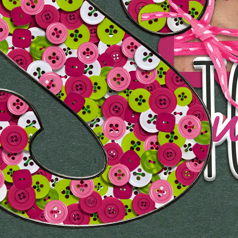 Digital illustration of a decorative letter S filled with pink, white, and lime-green buttons on a dark textured background with a pink ribbon accent.